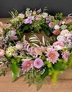 Coronas funerarias & Coronas de flores | Florístería Blooms